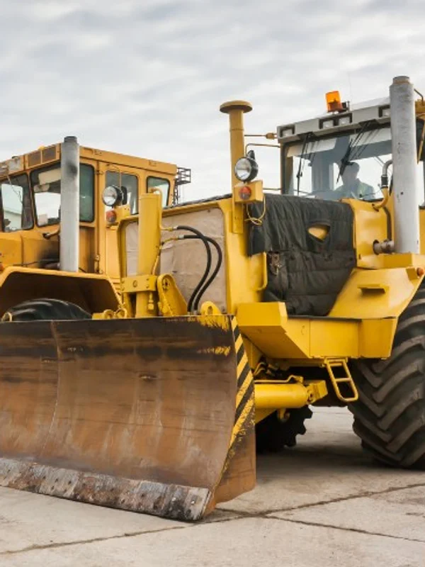 Heavy earthmoving equipment on a construction site